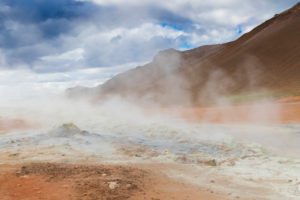 Landscape at Hverir, red sulphurous soil with fumaroles Landscape at Hverir, red sulphurous soil with fumaroles